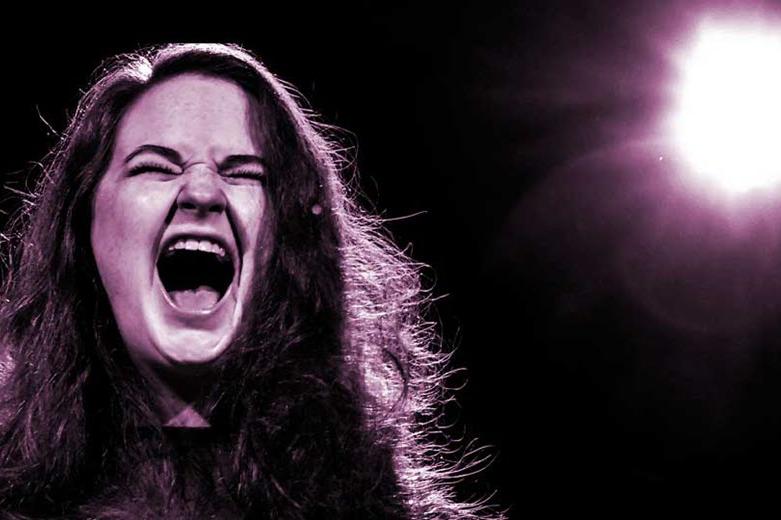 A girl screams during a performance at The Marcelle.
