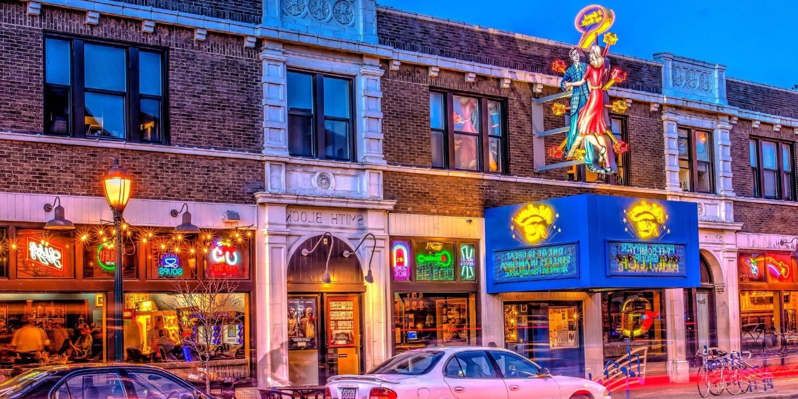 As the sun sets, neon signs light up the Delmar Loop and its businesses, including Blueberry Hill.