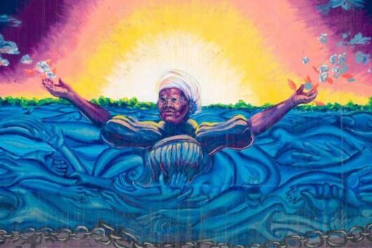 在那里 is a colorful, uplifting mural of Mary Meachum at the Underground Railroad site 在十大最大的网络彩票平台.